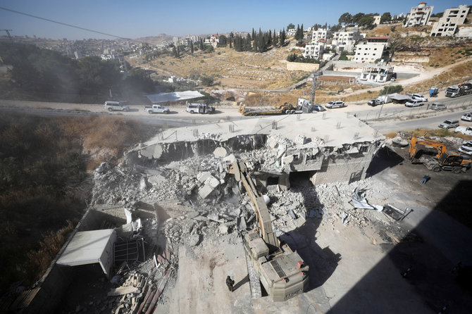„Reuters“/„Scanpix“ nuotr./Izraelis pradėjo griauti palestiniečių namus šalia Jeruzalės