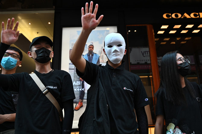 AFP/„Scanpix“ nuotr./Protestai Honkonge