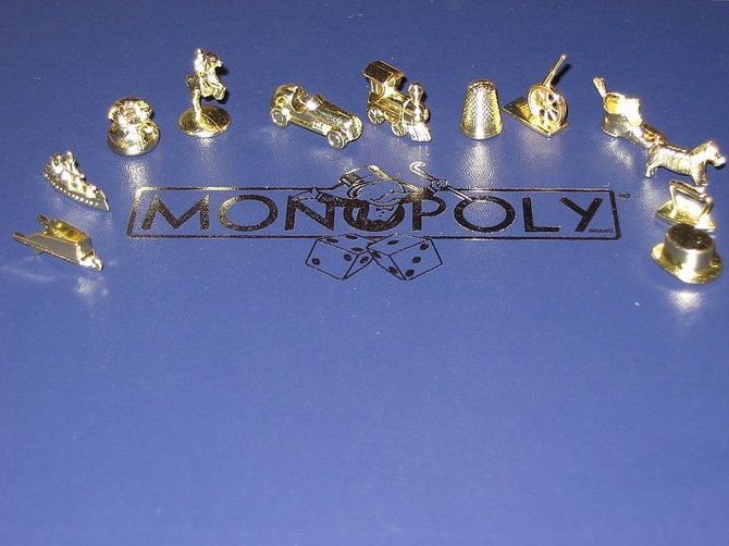 wikimedia.org nuotr./Žaidimo „Monopolis“ figūrėlės