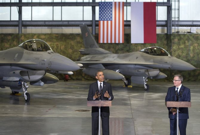 AFP/„Scanpix“ nuotr./Barackas Obama ir Bronislawas Komorowskis