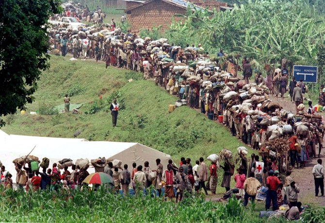 „Scanpix“ nuotr./Ruandos hutų pabėgėliai
