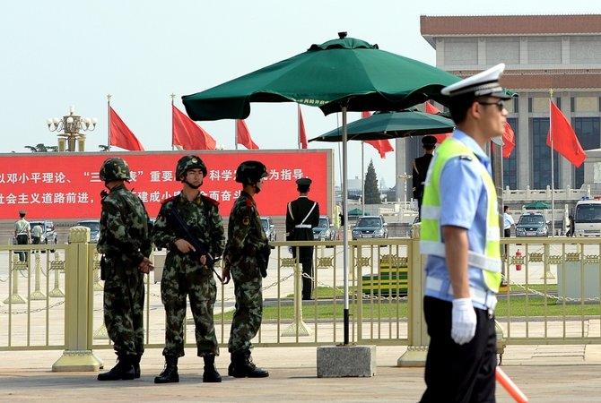 AFP/„Scanpix“ nuotr./Tiananmenio aikštėje sustiprinta apsauga, Kinijoje uždraustas bet koks viešas žudynių 25-mečio minėjimas