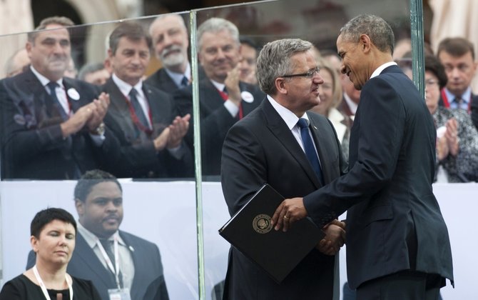 „Scanpix“ nuotr./Barackas Obama ir Bronislawas Komorowskis