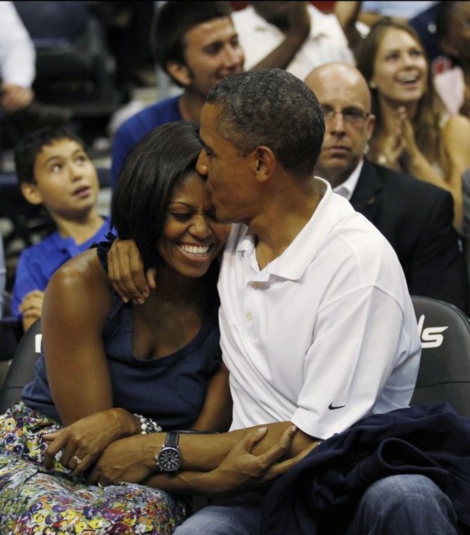„Scanpix“ nuotr./Barackas ir Michelle Obamos3