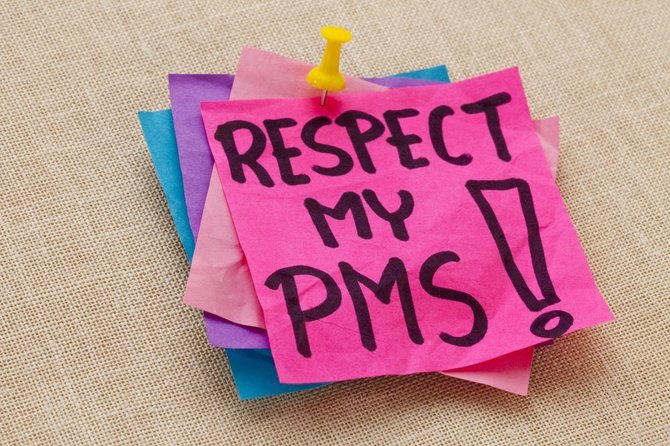 Fotolia nuotr./Užrašas: „Gerbk mano PMS!"