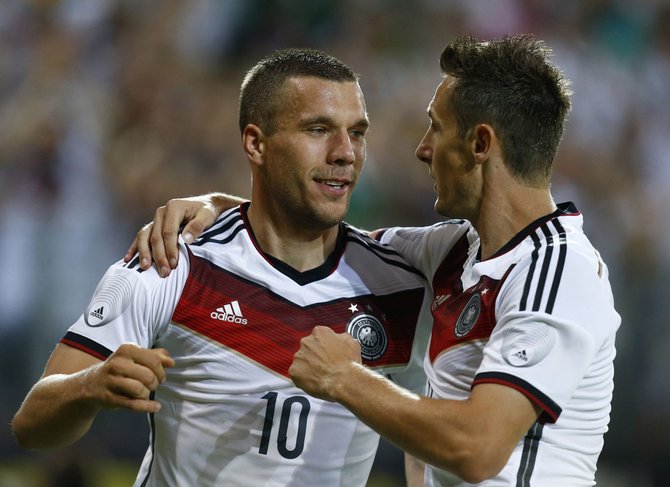 „Reuters“/„Scanpix“ nuotr./Lukasas Podolskis ir Miroslavas Klose