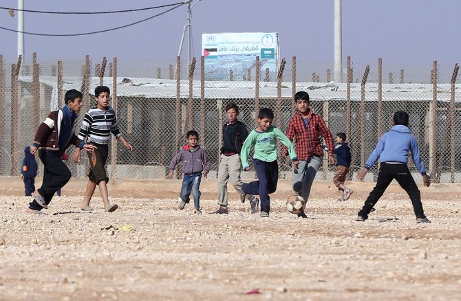 AFP/„Scanpix“ nuotr./Pabėgėliai iš Sirijos Jordanijoje