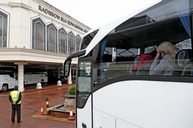 AFP/„Scanpix“ nuotr./JK viešbučiuose karantinuoti keliautojai