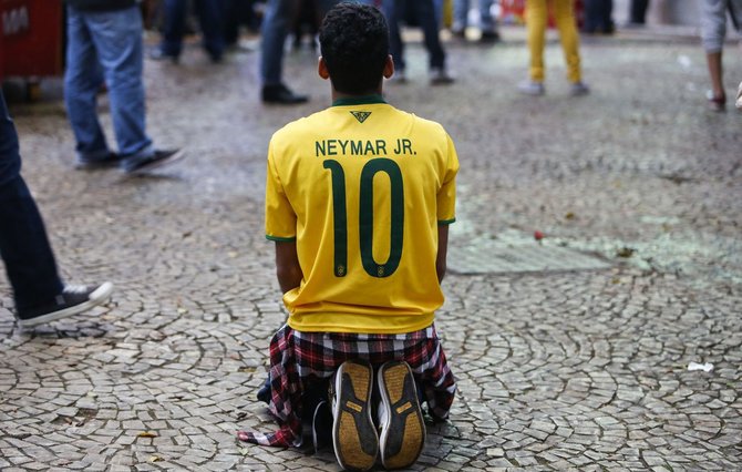 AFP/„Scanpix“ nuotr./Brazilijos futbolo rinktinės gerbėjai