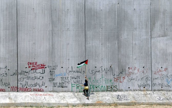 AFP/„Scanpix“ nuotr./Izraelio saugumo siena