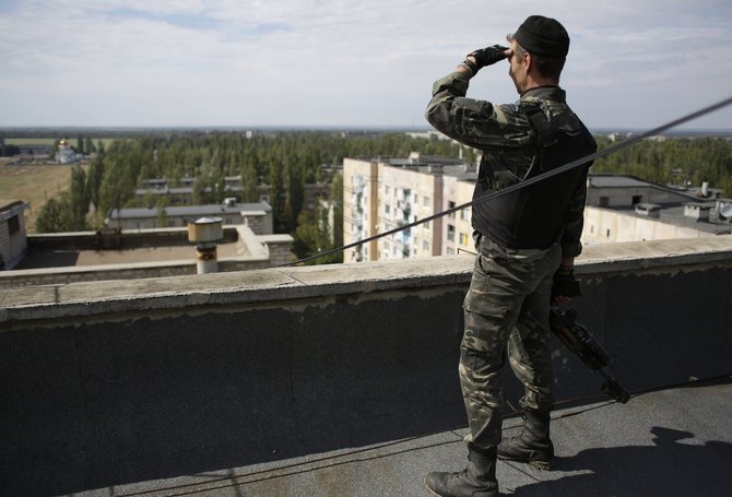 „Scanpix“/AP nuotr./Ukrainos karys Mariupolyje