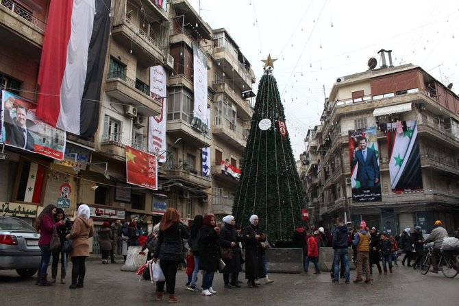 AFP/„Scanpix“ nuotr./Alepas Naujųjų metų išvakarėse