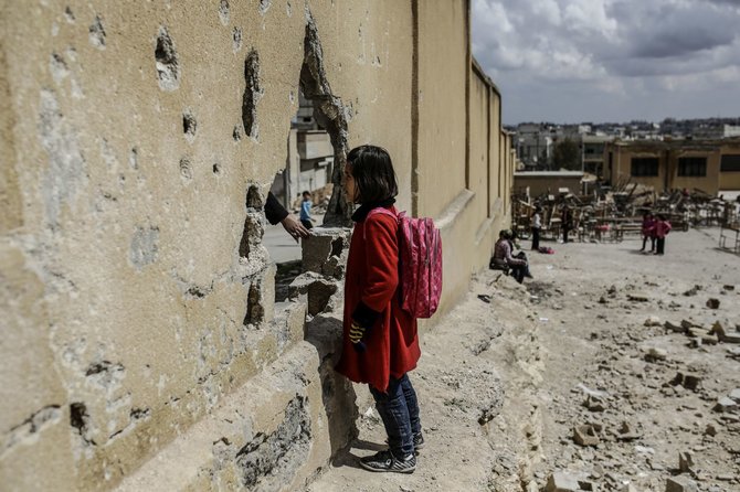 AFP/„Scanpix“ nuotr./Vaikai buvusioje IS teritorijoje