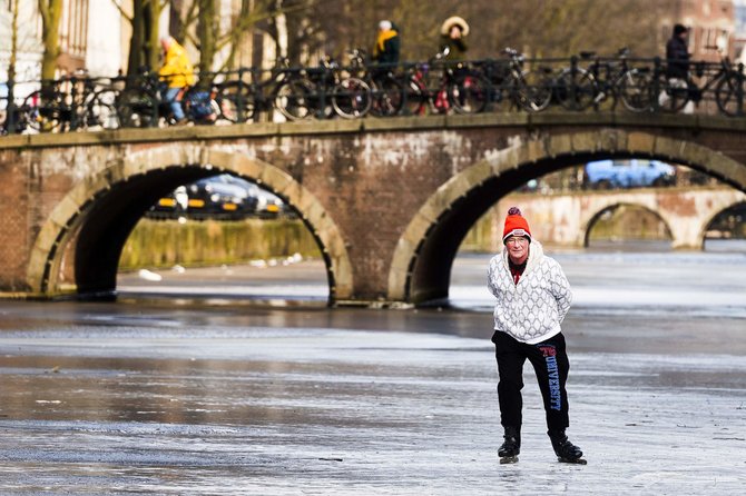 AFP/„Scanpix“ nuotr./Žiema Amsterdame