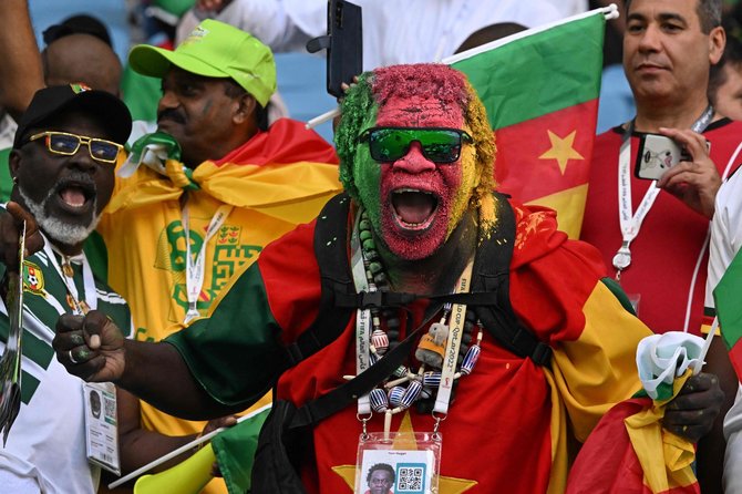 AFP/„Scanpix“ nuotr./Kamerūnos sirgalius