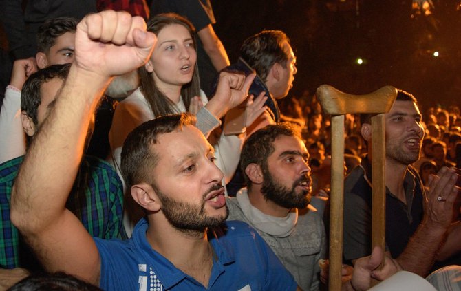 AFP/„Scanpix“ nuotr./Protestuotojai Armėnijoje