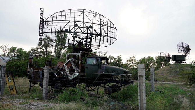 AFP/„Scanpix“ nuotr./Palikta Rusijos karinė technika Charkivo regione