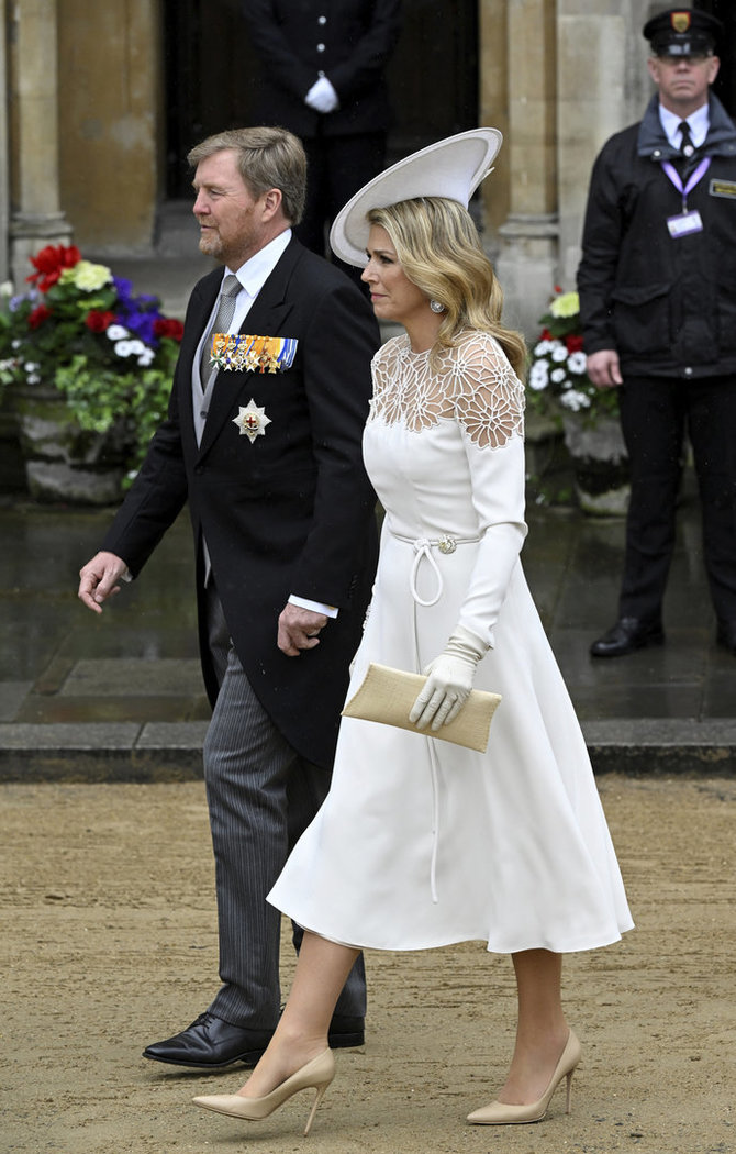 AFP/„Scanpix“ nuotr./Svečiai renkasi į Karolio III karūnavimo ceremoniją