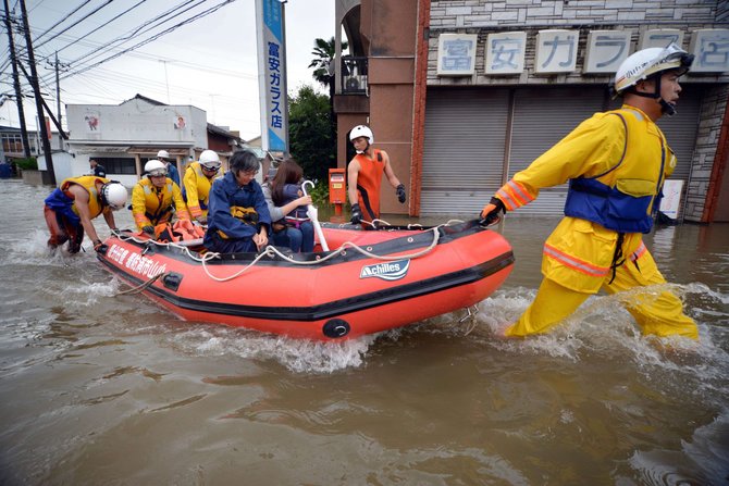 AFP/„Scanpix“ nuotr./Potvynis Japonijoje