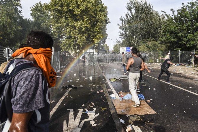AFP/„Scanpix“ nuotr./Migrantų keliami neramumai Vengrijoje