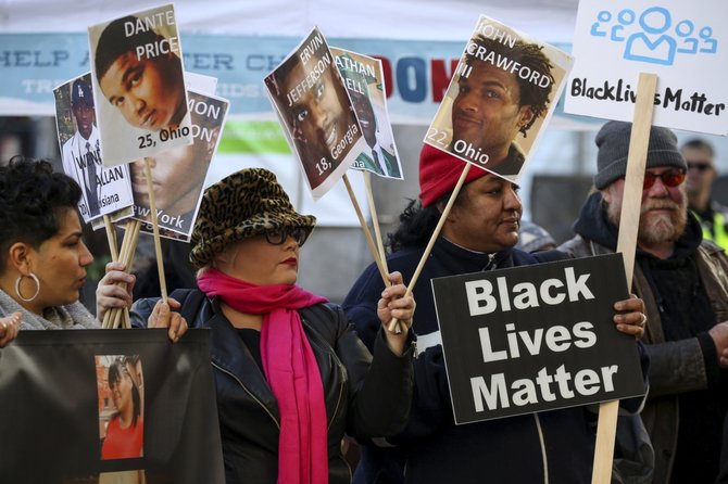 „Reuters“/„Scanpix“ nuotr./5. „Black Lives Matter“ judėjimas JAV dėl policijos nekaltai nužudomų juodaodžių