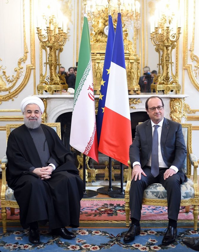 AFP/„Scanpix“ nuotr./Prancūzijoje vieši Irano prezidentas Hassanas Rouhani