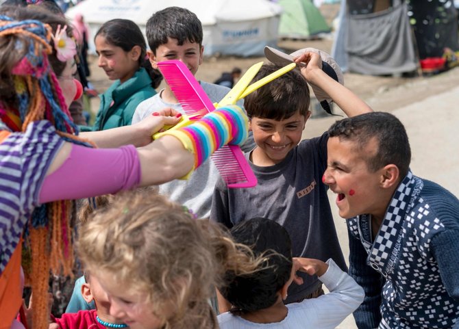 AFP/„Scanpix“ nuotr./Migrantų vaikai Europoje