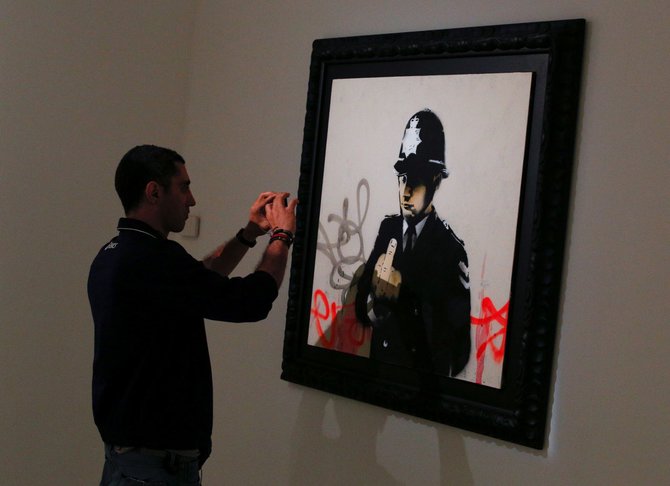 „Reuters“/„Scanpix“ nuotr./Banksy darbų paroda Italijoje