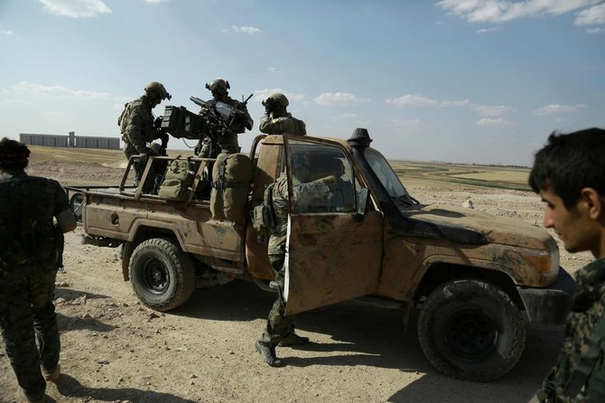 AFP/„Scanpix“ nuotr./JAV specialiųjų pajėgų kariai Sirijoje