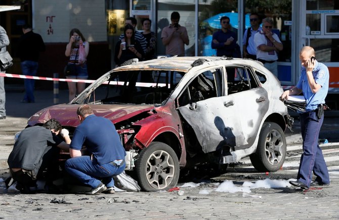 „Reuters“/„Scanpix“ nuotr./Kijevo centre sprogus automobiliui žuvo žurnalistas Pavelas Šeremetas