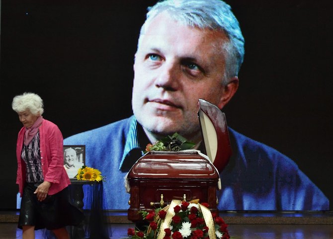 AFP/„Scanpix“ nuotr./Žurnalisto Pavelo Šeremeto laidotuvės