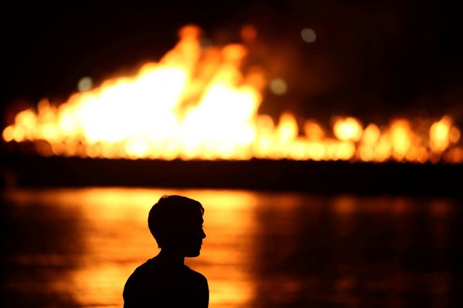 „Reuters“/„Scanpix“ nuotr./Londone minint 1666-ųjų didžiojo gaisro metines padegta didžiulis medinis miesto maketas