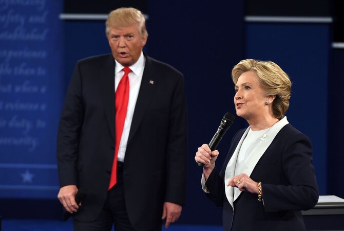 AFP/„Scanpix“ nuotr./Donaldo Trumpo ir Hillary Clinton antrieji debatai