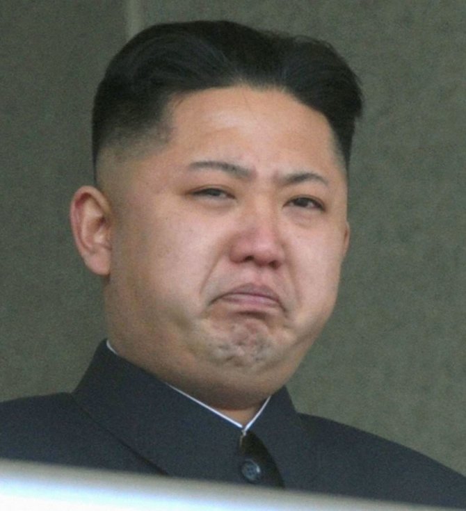 AFP/„Scanpix“ nuotr./Kim Jong Unas gedi mirusio tėvo