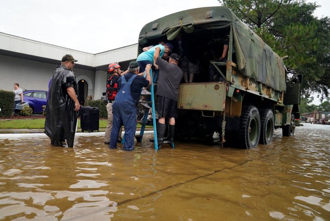 „Reuters“/„Scanpix“ nuotr./Teksasui smogusio uragano „Harvey“ padariniai