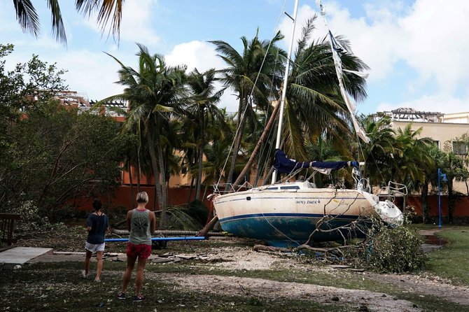 „Reuters“/„Scanpix“ nuotr./Majamis po uragano
