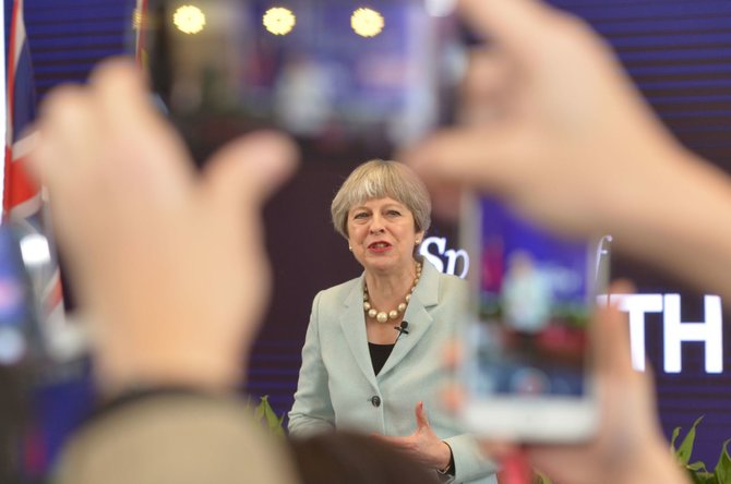 AFP/„Scanpix“ nuotr./ Theresa May vizitas Kinijoje