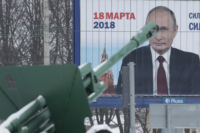 „Reuters“/„Scanpix“ nuotr./Vladimiro Putino rinkiminis plakatas