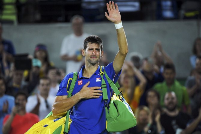„Scanpix“ nuotr./Novakas Džokovičius Rio olimpiados pirmame etape nusileido Juanui Martinui del Potro