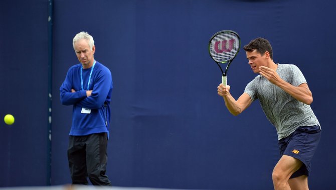 AFP/„Scanpix“ nuotr./Johnas McEnroe ir Milošas Raoničius