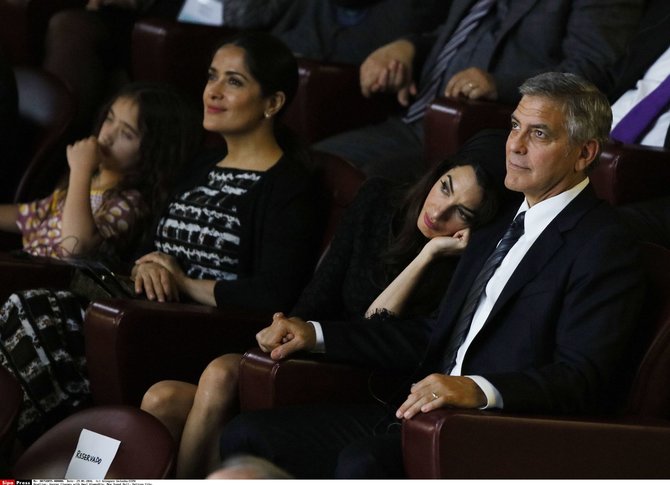 Scanpix nuotr./George'as Clooney su Amal Clooney