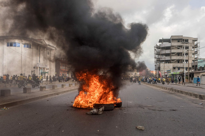 AFP/„Scanpix“ nuotr./Protestai Benine