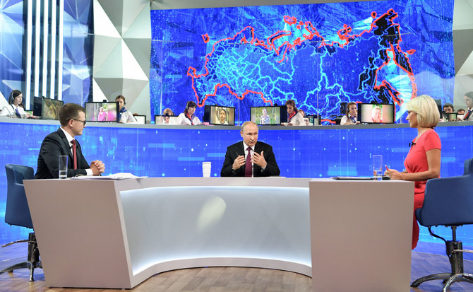 „Scanpix“ nuotr./V.Putinas eilinį kartą atsakinėjo į rusų klausimus