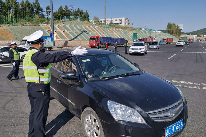 AFP/„Scanpix“ nuotr./Iš dalies uždarytas Džilino miestas Kinijoje