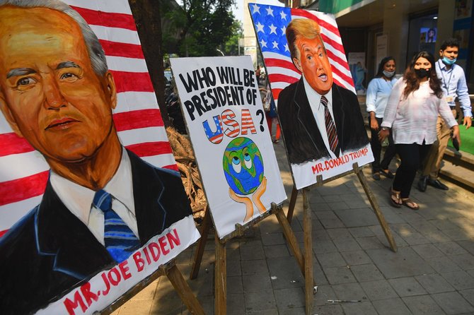 AFP/„Scanpix“ nuotr./Amerikiečiai šiemet balsuoja kaip niekada aktyviai, bet dešimtys milijonų savo nuomonės ir vėl nepareikš