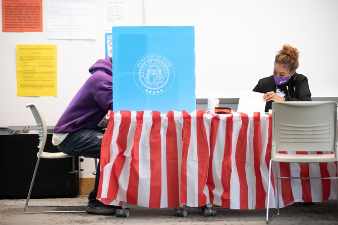 AFP/„Scanpix“ nuotr./Balsavimas didžiausiame Džordžijos mieste Atlantoje