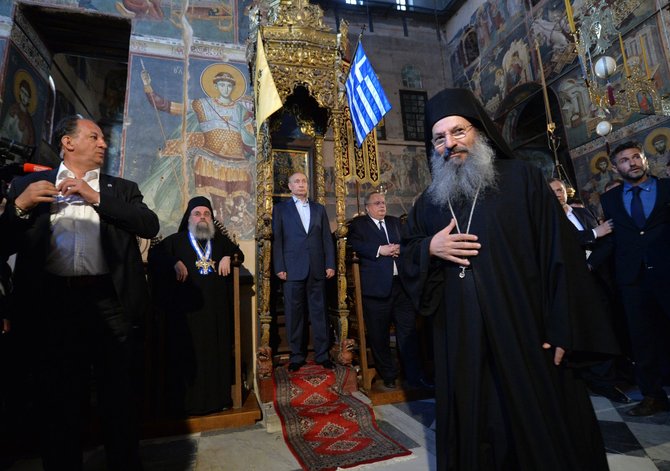 „Scanpix“ nuotr./Vladimiras Putinas pas vienuolius Graikijoje