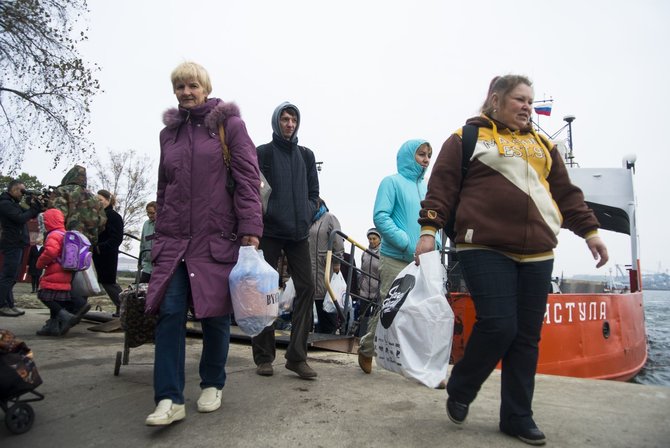 „Scanpix“/AP nuotr./Kaliningrado srityje daugelis žmonių netiki, kad bus karas, bet vis tiek yra įsibaiminę