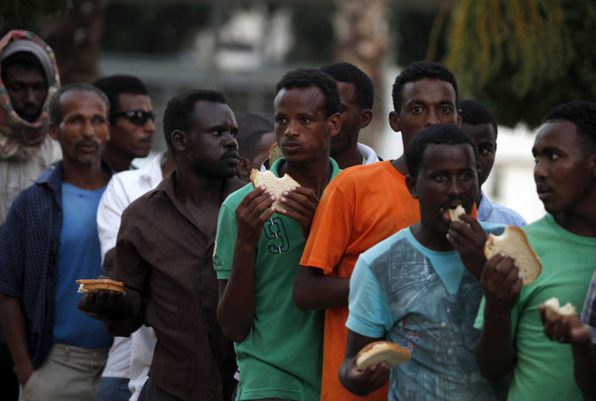 „Reuters“/„Scanpix“ nuotr./Nelegalūs imigrantai iš Afrikos Izraelyje