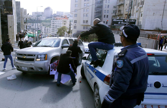 AFP/„Scanpix“ nuotr./Dėl palestiniečių protesto JAV delegacija spruko iš renginio Betliejuje